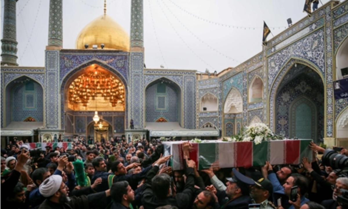 Iran's President Ebrahim Raisi's funeral procession was at a Muslim Shiite Shrine in Tehran, where caskets of him and seven others were kept for the mourners to bid adieu to.