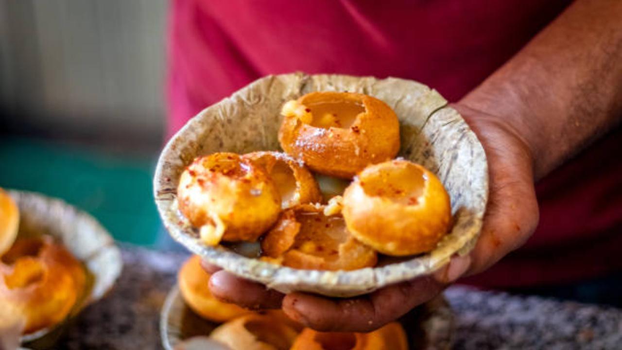 Pani puri is a deep-fried breaded hollow spherical shell, about an inch in diameter, filled with a combination of finely diced potato, onion, peas and chickpea. Pic/iStock