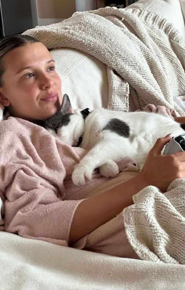 Millie Bobby Brown looks so comfortable while lounging with her cat