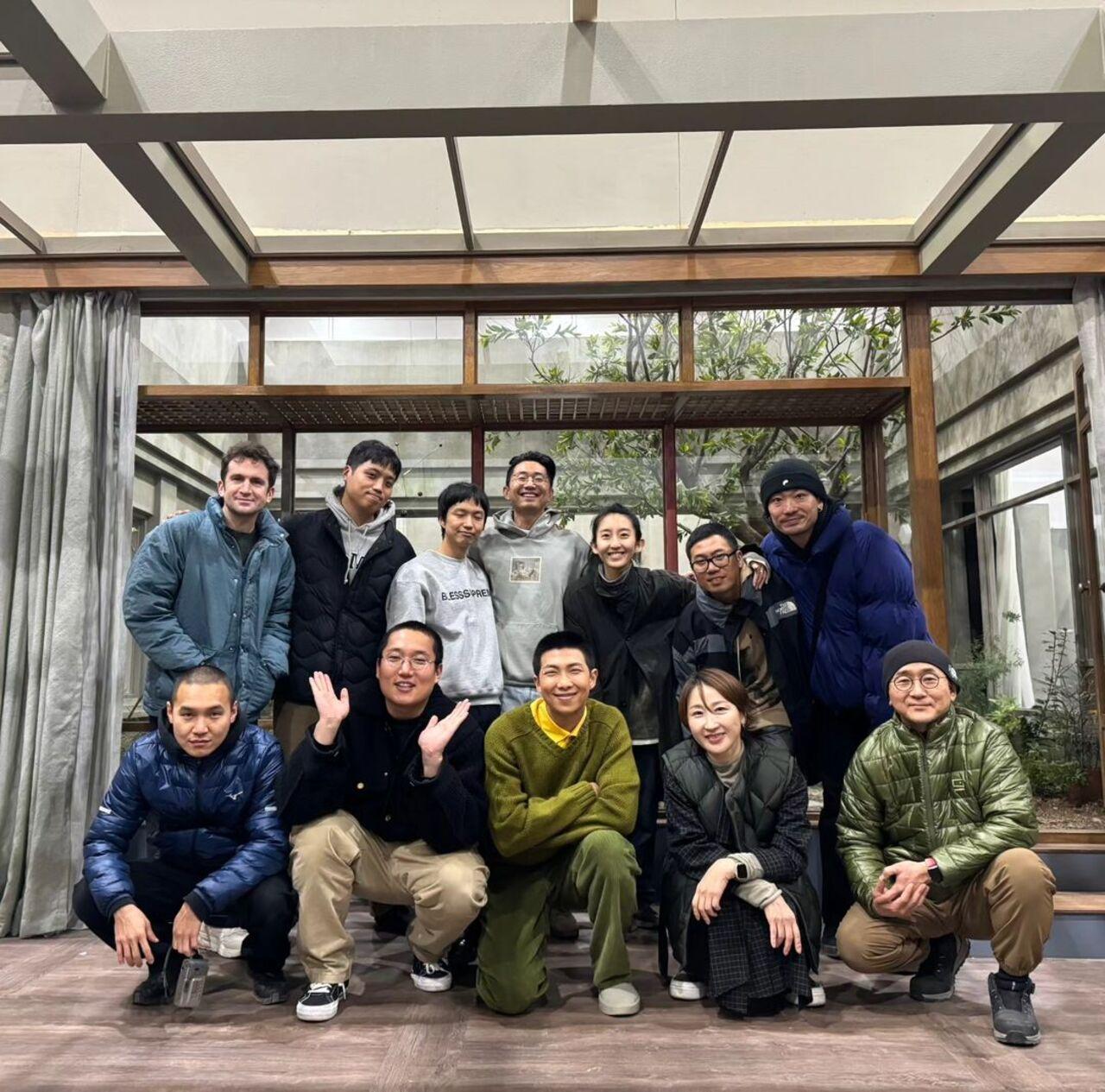 The BTS leader also posed with the crew members who worked hard to put together the music video. 