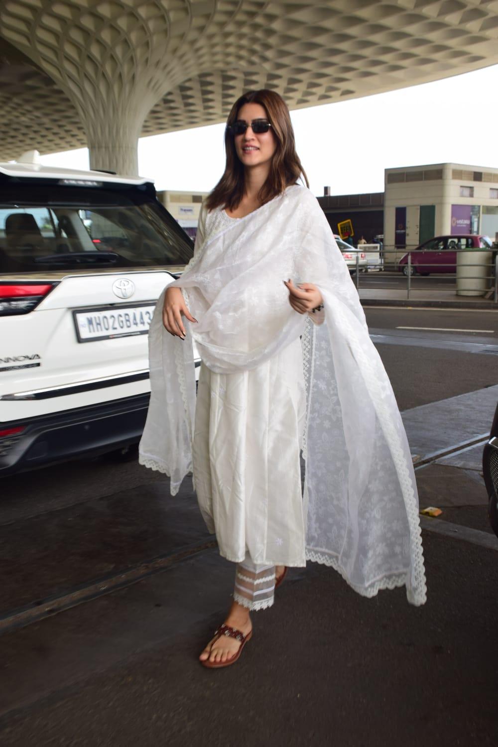 Kriti Sanon aced her airport look in a white anarkali suit