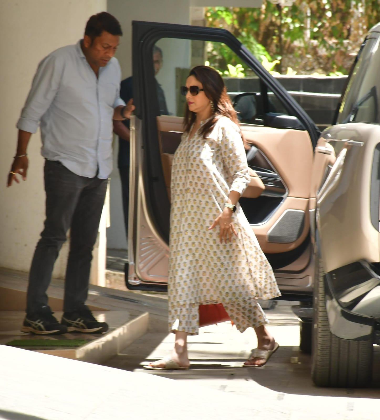 Madhuri Dixit looked stunning in a light-coloured suit as she was clicked in the city