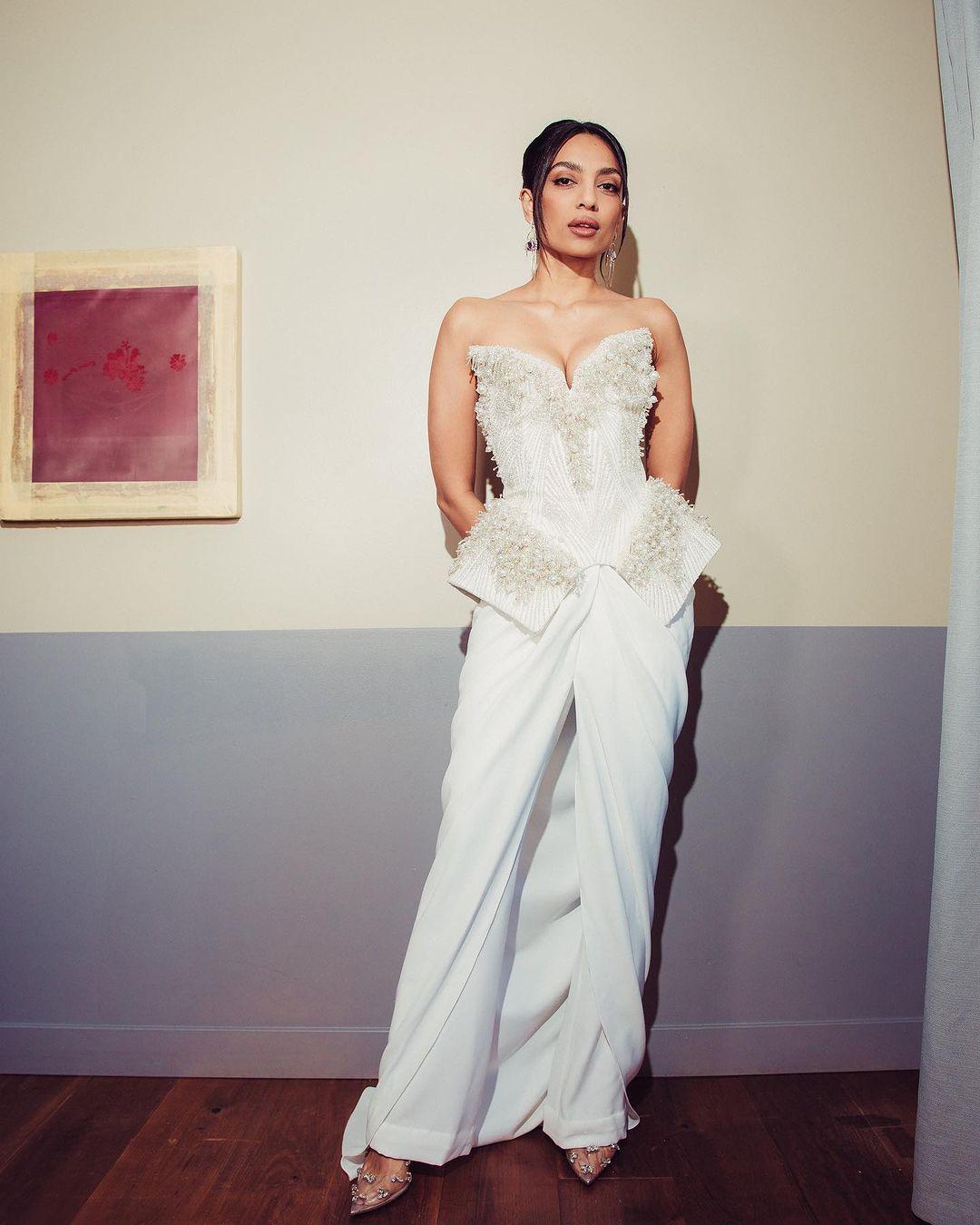 Sobhita Dhulipala wowed everyone at the screening of her new film, Monkey Man. She turned heads in an all-white outfit, choosing a sculpted dress by Indian designer Gaurav Gupta.