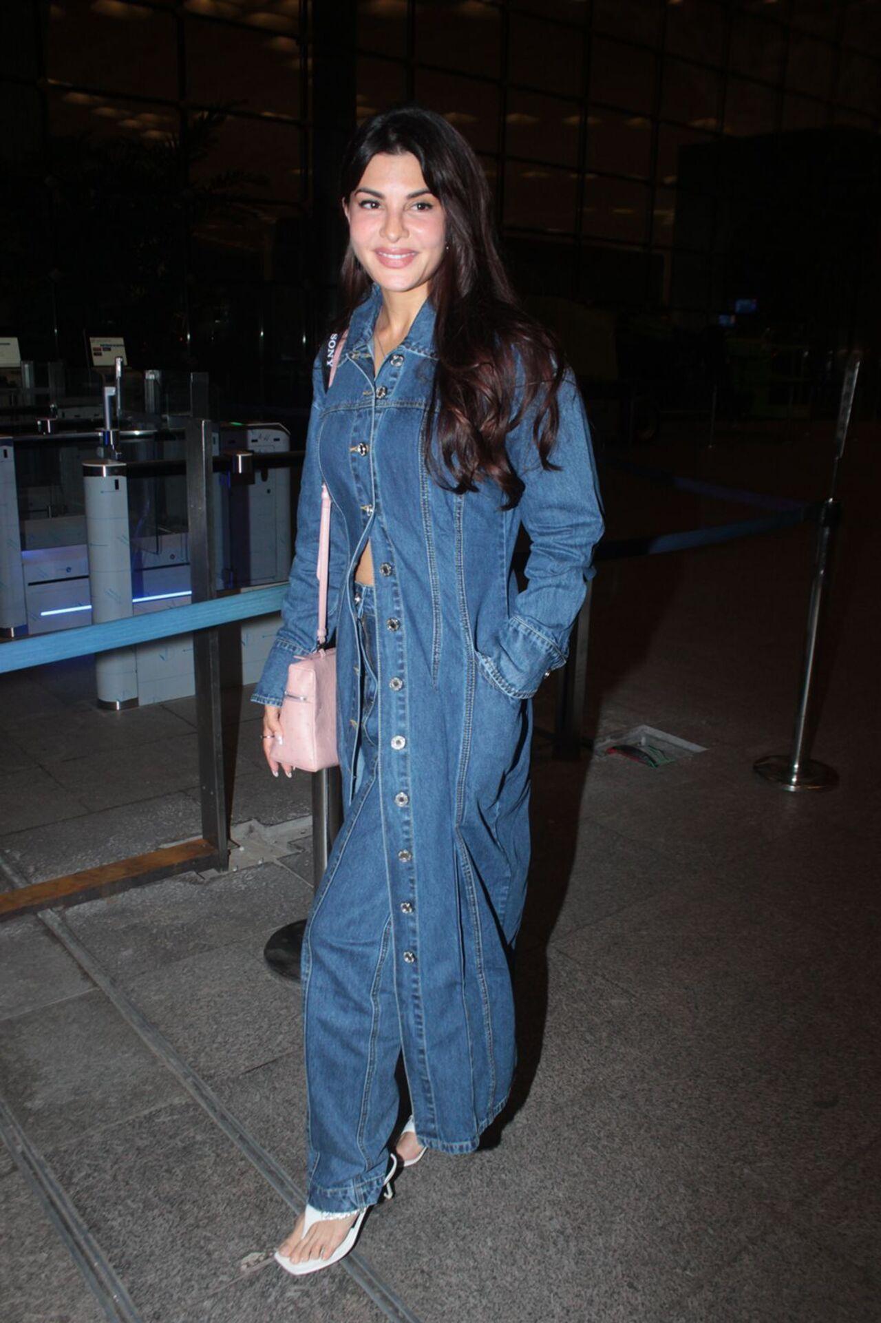 Actress Jacqueline Fernandez wore a denim jumpsuit as she jetted off to the 2024 Cannes Film Festival. 