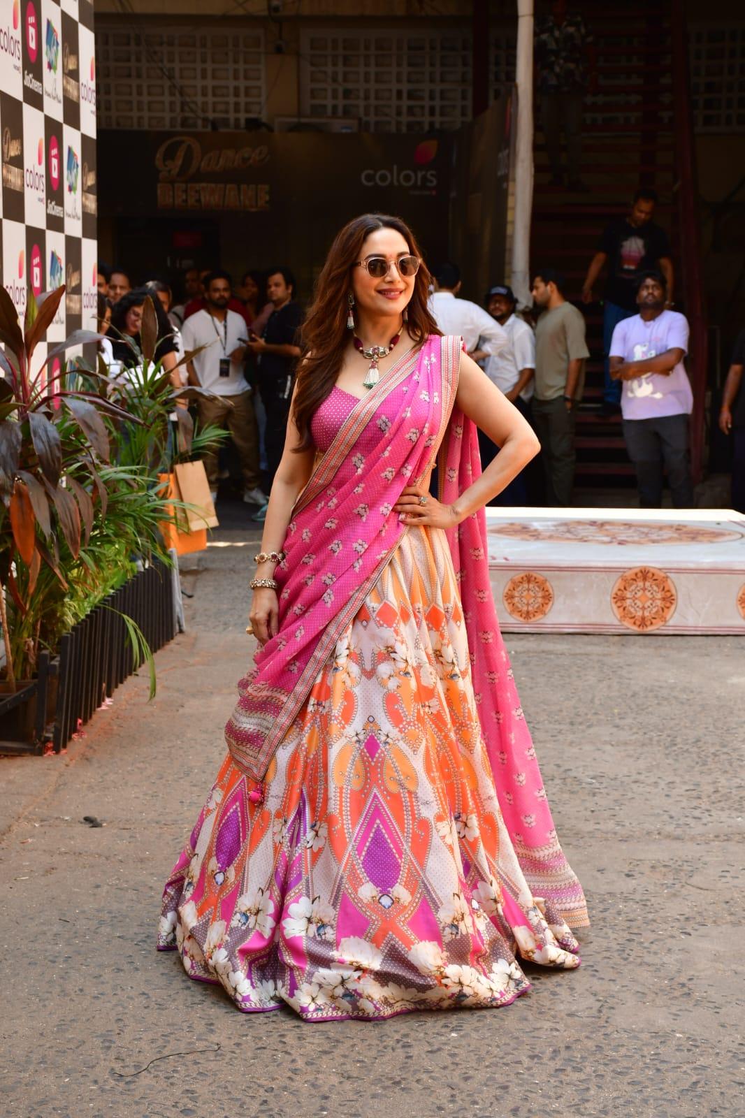 Madhuri Dixit looked glamourous in a multi-coloured lehenga. The actress was snapped at Dance Deewane's set