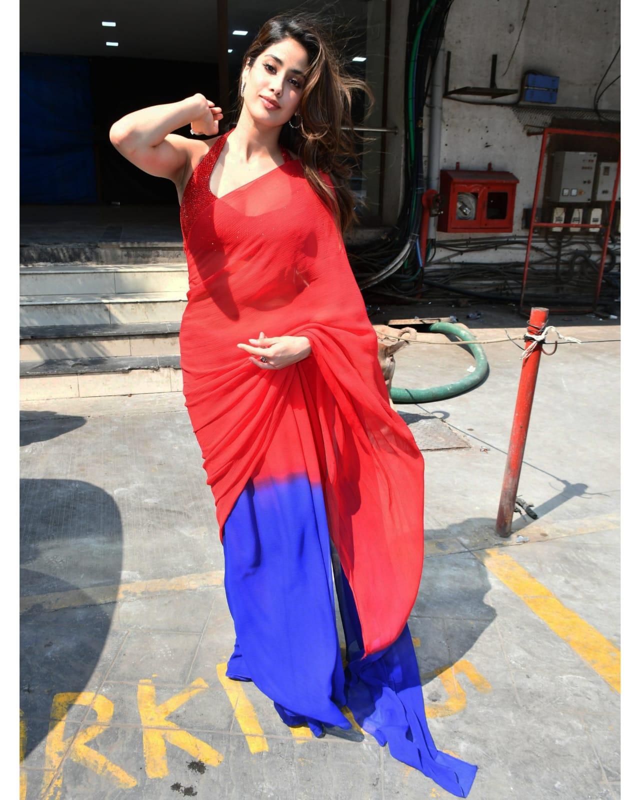 Janhvi Kapoor opted for a stunning red and blue saree as she went to promote her upcoming film Mr. & Mrs. Mahi