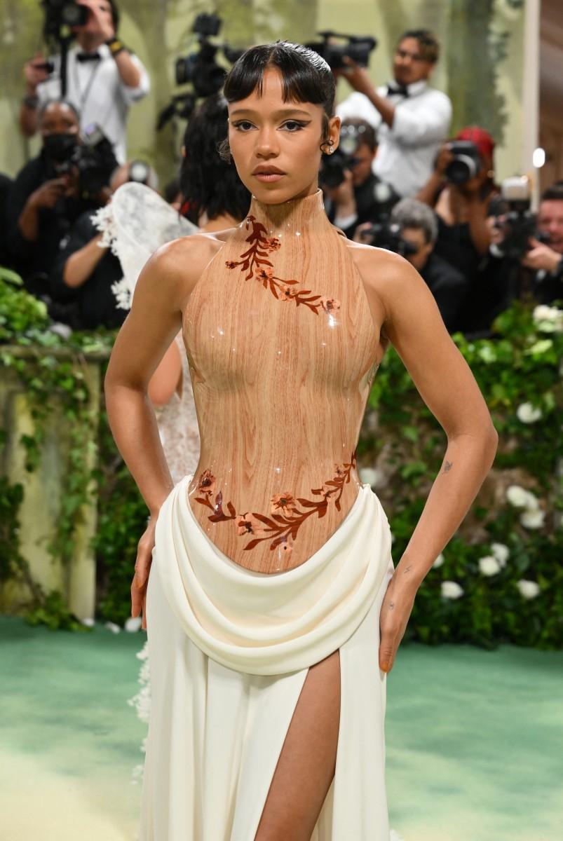 At the 2024 Met Gala, Taylor Russell turned heads as she resembled a walking sculpture in a body-cast bodice and skirt.
