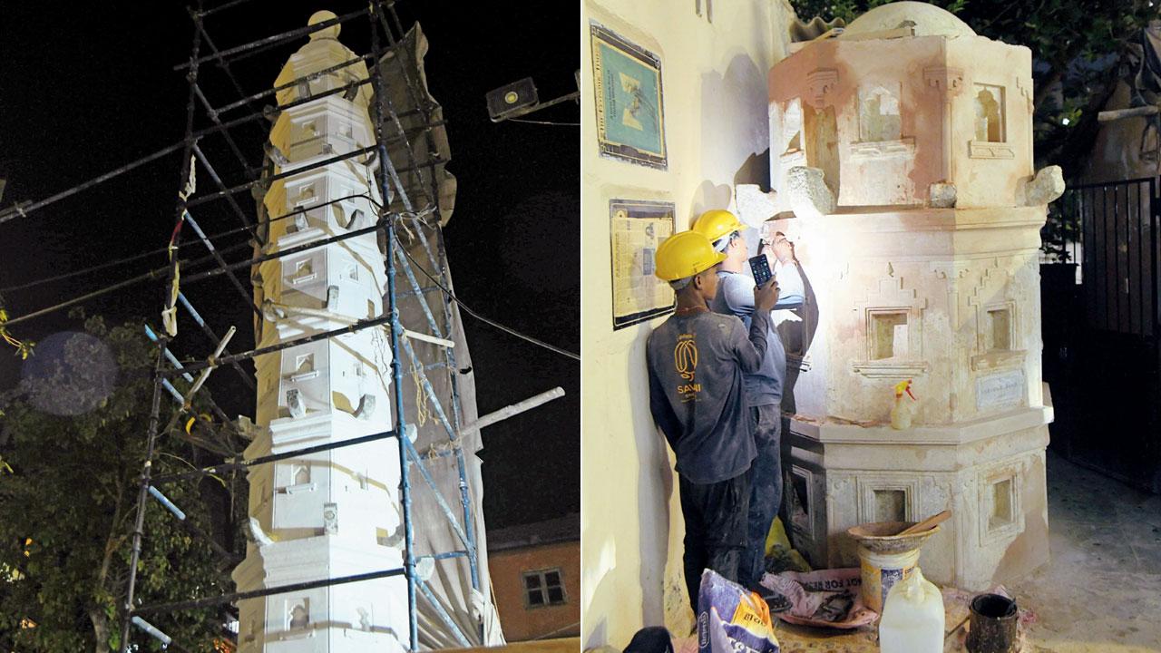 Restoration of the 16 lamp pillars; Workers carefully undertaking restoration work