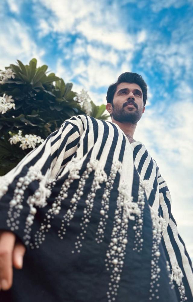 Style icon Vijay Devrakonda looked jaw-dropping in a black-and-white striped shirt paired with black pants