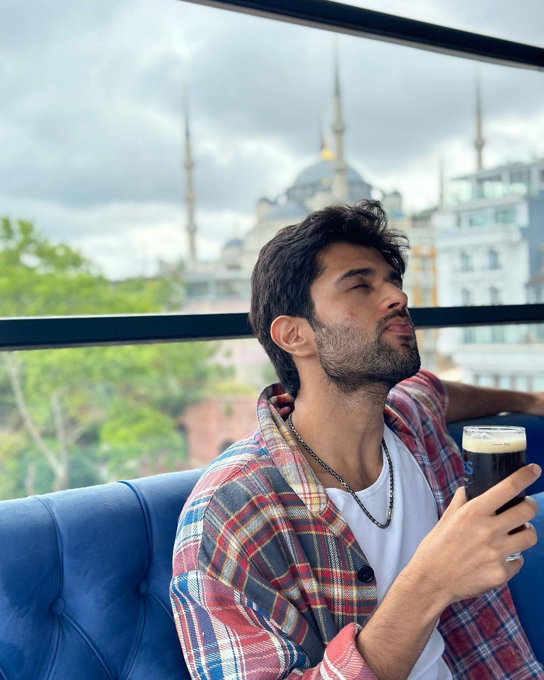 Vijay Deverakonda seems to favour white undershirts. He was spotted sporting a plaid overshirt buttoned down over one. It's definitely a smart choice for summer!