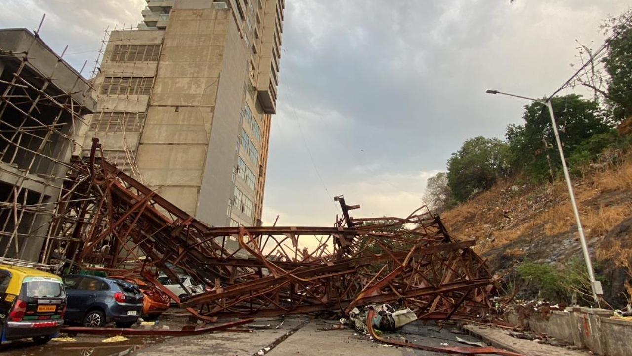 IN PHOTOS: Under-construction metal parking tower collapses amid winds in city