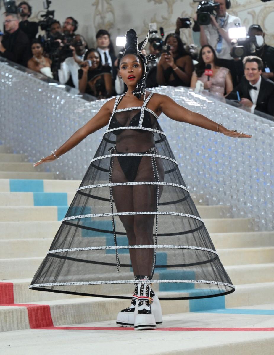 Janelle Monáe's outfit at the event fell short of expectations, despite its tribute to the late Karl Lagerfeld. Her all-black-and-white ensemble, consisting of an oversized coat over a sheer, wireframe gown, failed to impress. Going even further, she removed layers on the red carpet, exposing a pearl-embellished bikini under the see-through dress.