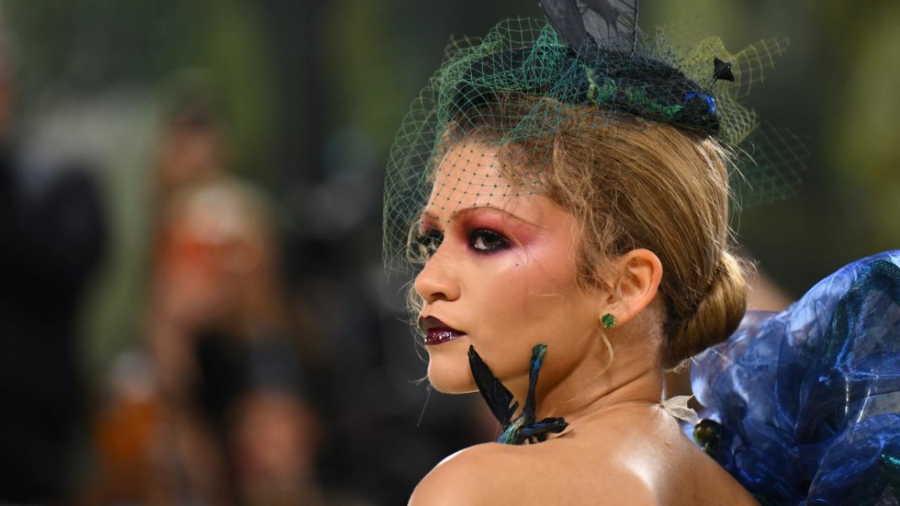 Her choice of attire aligned flawlessly with the Garden of Time motif, encouraging guests to embrace the essence of the natural world in their fashion selections. Pic/AFP