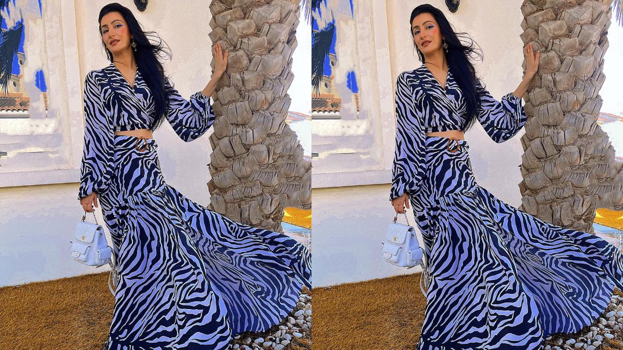Passi gives a 'Starry Night' vibe in this flowy dress. 