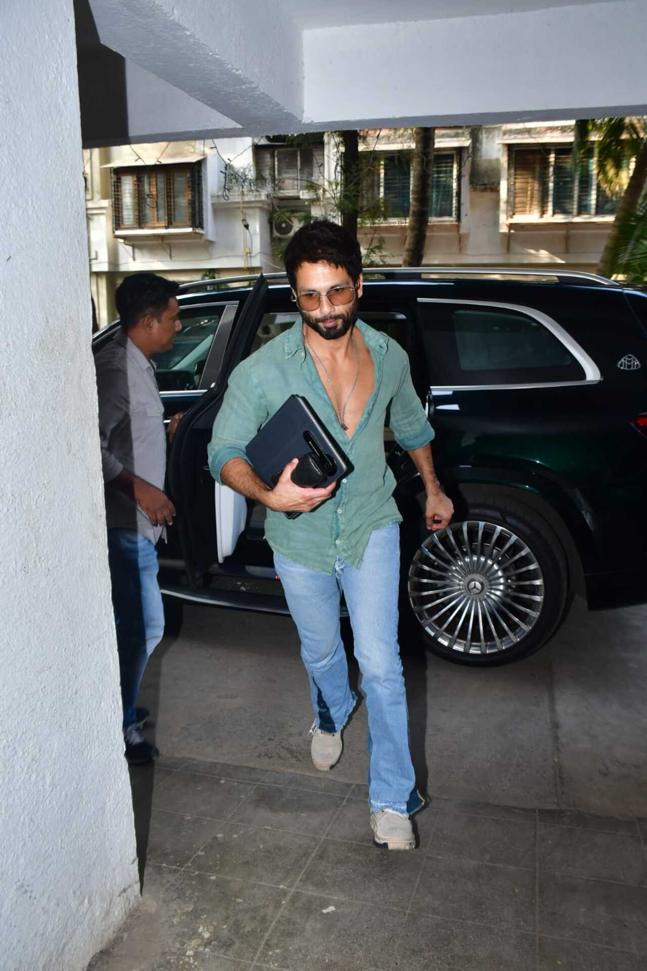 Shahid Kapoor seemed to be in a hurry as he got papped in the city. Is that a new script we see in his hand? 