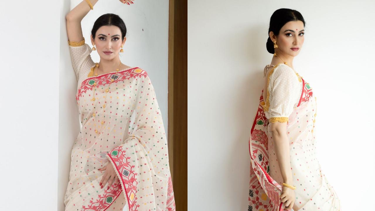 Passi looks elegant in a handwoven Jamdani saree on the occasion of National Handloom Day. She pairs it with minimalistic gold jewellery. 