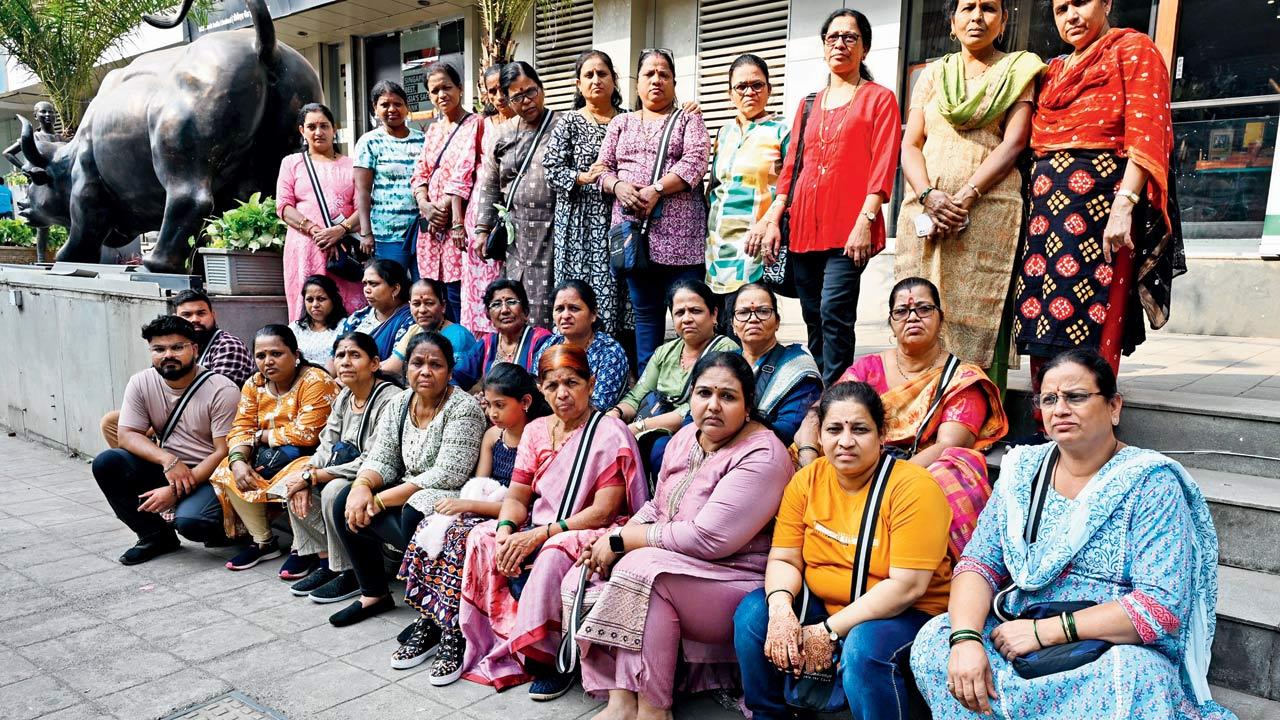 The women sit outside Royal Nepal Airlines’ office in Andheri East on Tuesday. Pics/Kirti Surve Parade