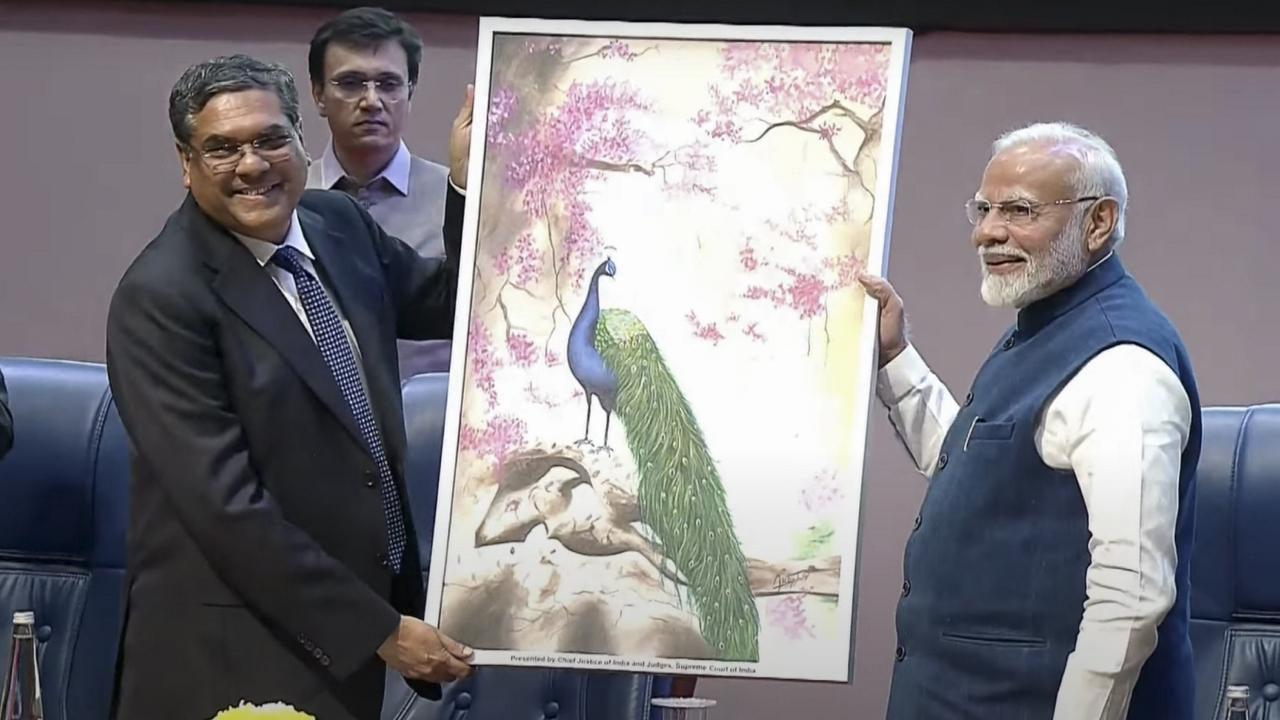 Constitution Day: CJI presents painting made by prisoner to PM Modi