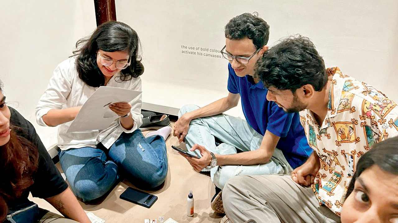 Participants engage in a game during an artcade night in Bandra