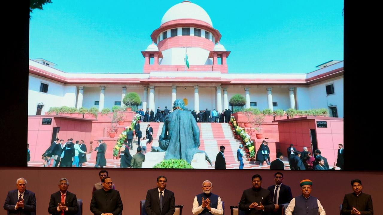 PM Modi with CJI Sanjiv Khanna, Union Minister Arjun Ram Meghwal, Attorney General R Venkataramani, Supreme Court Bar Association President Kapil Sibal and others during Constitution Day celebrations. Pics/PTI