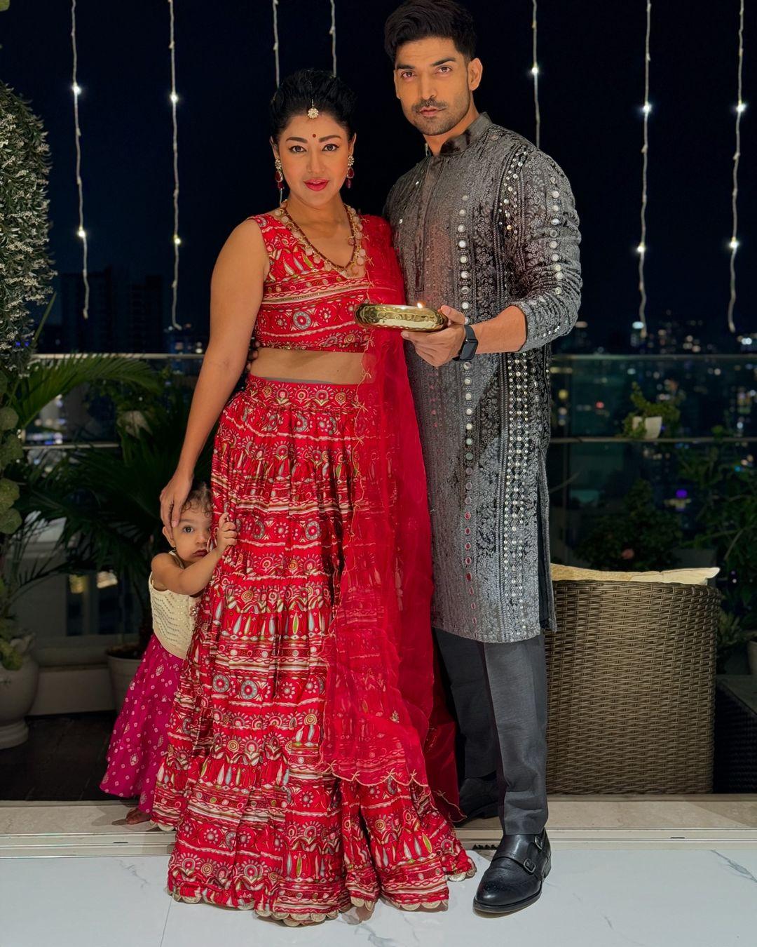 Debina Bonnerjee took to Instagram and shared a stunning picture with Gurmeet Chaudhary. The actress looked beautiful in a red printed lehenga, while Chaudhary aced his look in a grey kurta-pajama.
 