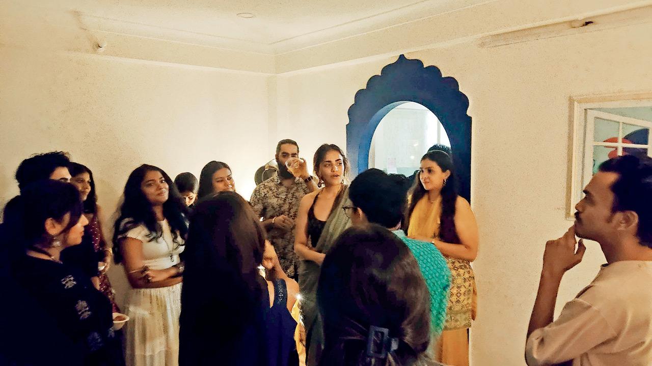 Participants in a discussion at a previous community dinner