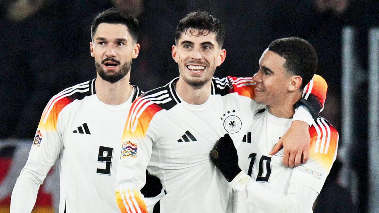 Germany’s Kai Havertz (centre) is all smiles after his goal v Bosnia in Freiburg on Saturday. Pic/AFP