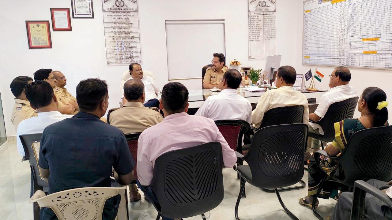 Hanuman Koliwada fishermen during a high-level meeting with the deputy collector (rehabilitation) and senior police officials