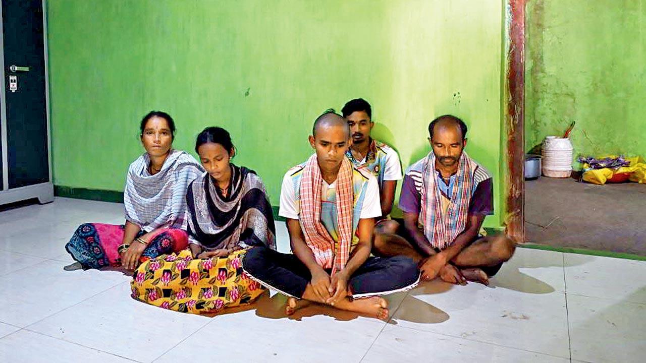 Navsaya (in black pants), Anita (wearing black shawl) and other relatives of Ambi Kadu, who died on November 7