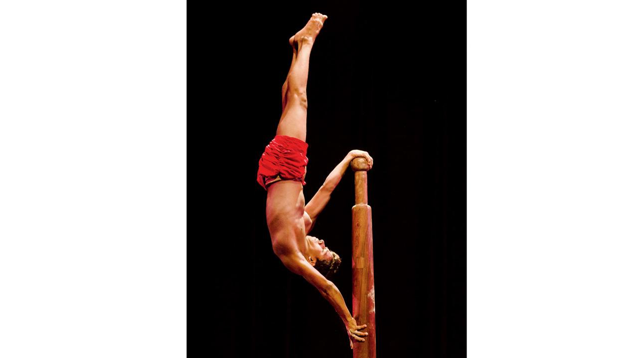 A mallakhamb artiste showcases his flexibility and core strength 