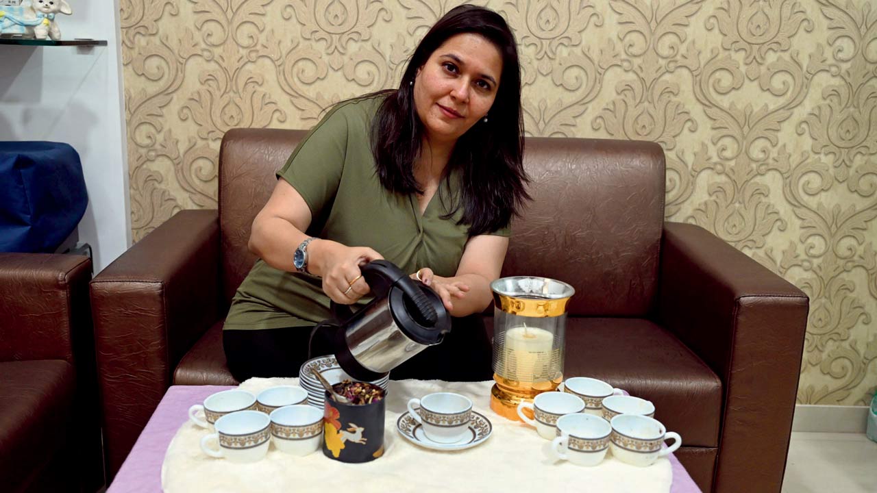 Tasseography practitioner Ekta Sunil Thaker preps for a tea leaf reading session at her Ghatkopar office. Pic/Sayyed Sameer Abedi