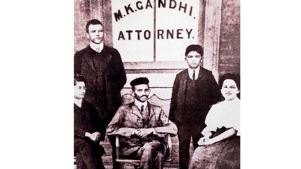 The author investigates the connection between Mohandas Karamchand Gandhi (third from left), pictured at his legal practice office in Johannesburg in 1905, and her ancestor, the “Other Mohan”. Pic/Getty Images