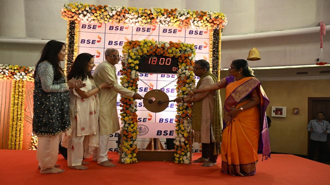 BSE's Chief Executive Office (CEO) Sundararaman Ramamurthy (right), along with Amit Chandra, the chairperson and founder of Bain Capital, ring the Muhurat trading bell  