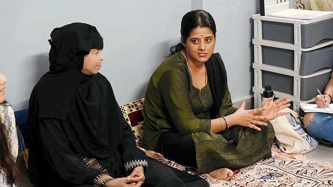 Two women engage in a discussion during one of the podcast sessions