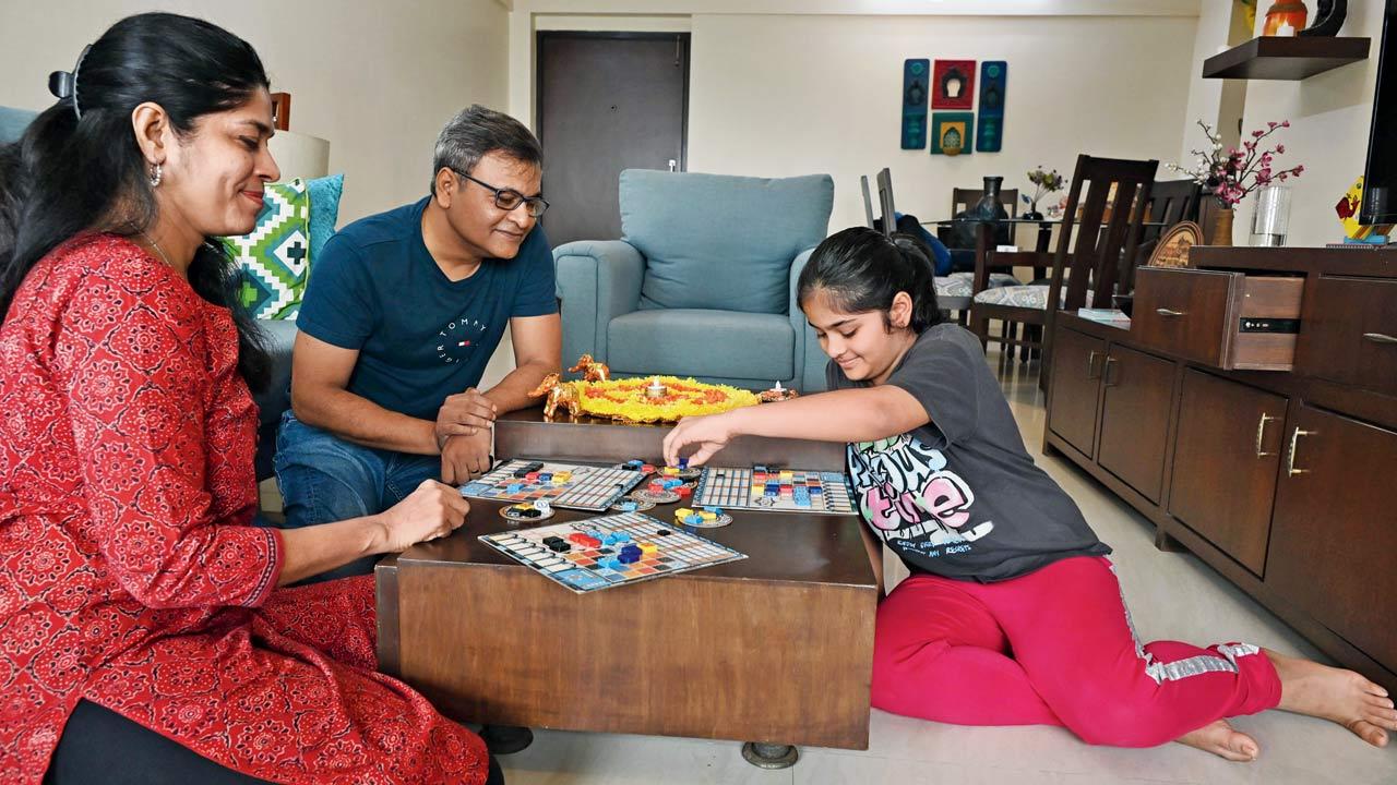 Prisha Dasgupta with her parents at her residence at Malad West. She does not depend on screens and indulges in other co-curricular activities that set her apart from her peers. Pic/Anurag Ahire