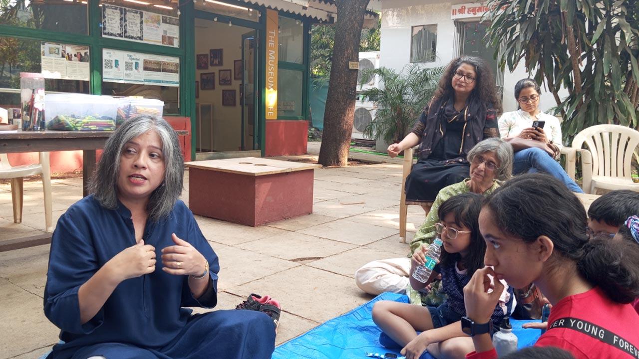 Priya Aga- Priya Aga with children at a previous storytelling session