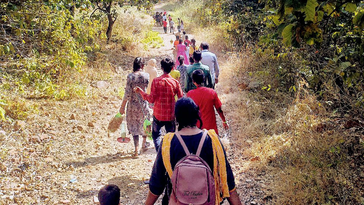 Children of Palaspada take a walk through the forest 