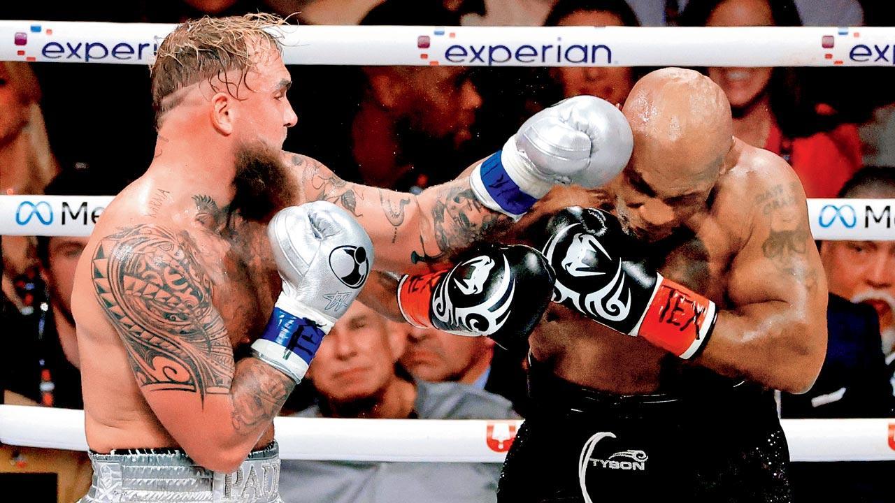 Paul beats 58-year-old Tyson as hits don’t match the hype