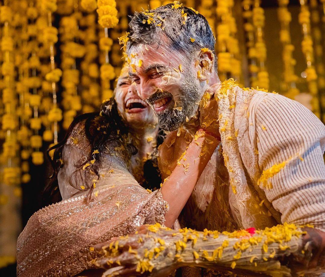 Another photo gives a glimpse into the haldi ceremony, a joyous pre-wedding ritual. The radiant glow on both Athiya and Rahul’s faces reflects the love and happiness surrounding them. 
