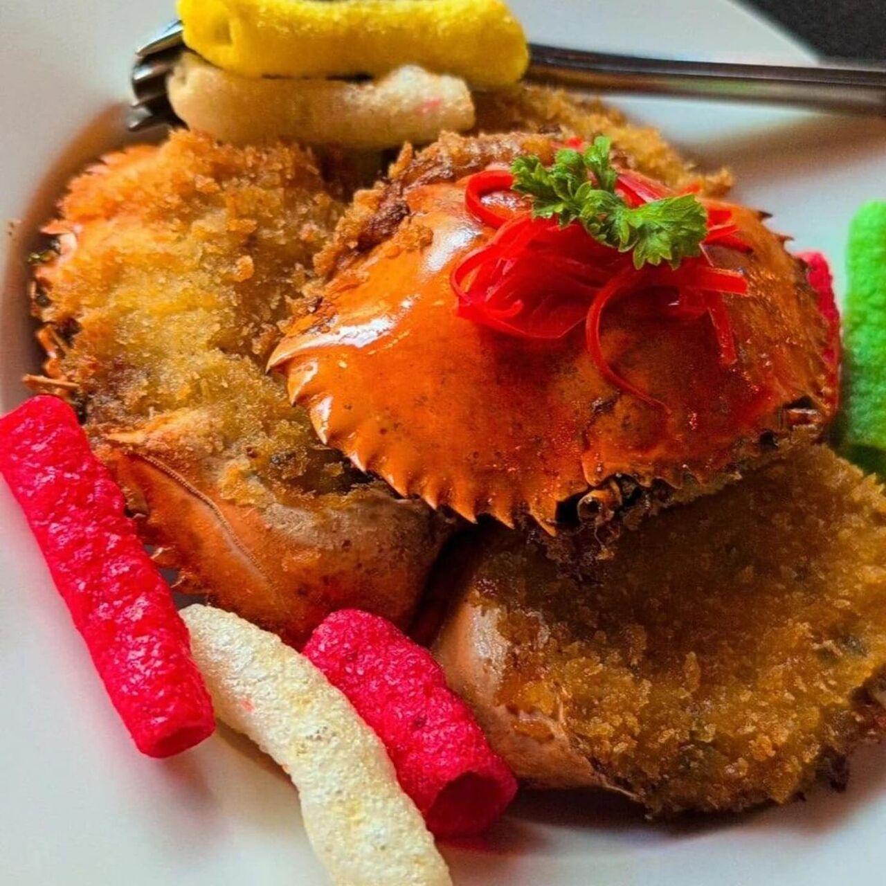 Here's everything she ate including the name of the restaurant. Baked crabs at Avo's Kitchen.