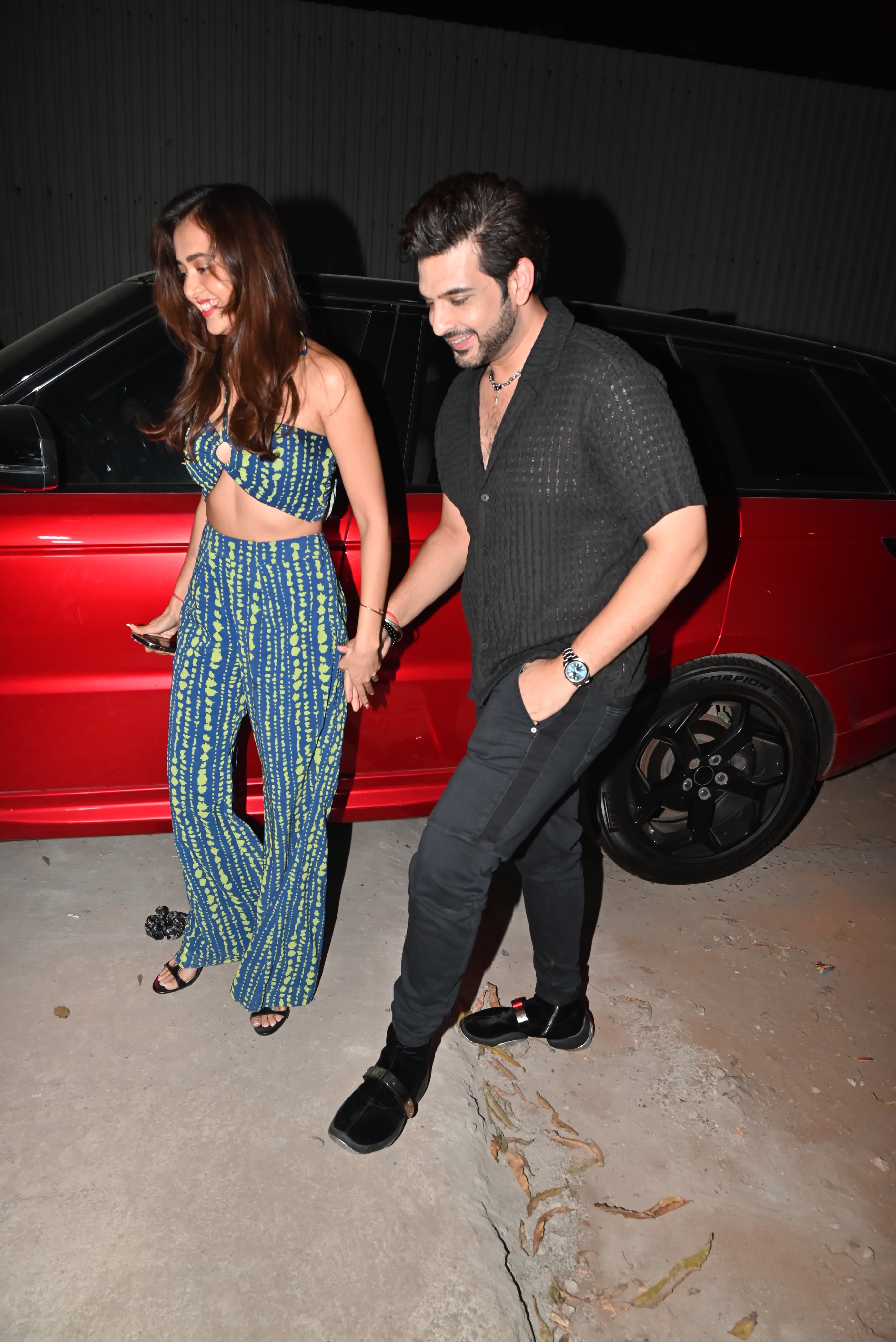 Karan Kundrra and Tejasswi Prakash were giving major couple goals as they walked hand in hand.