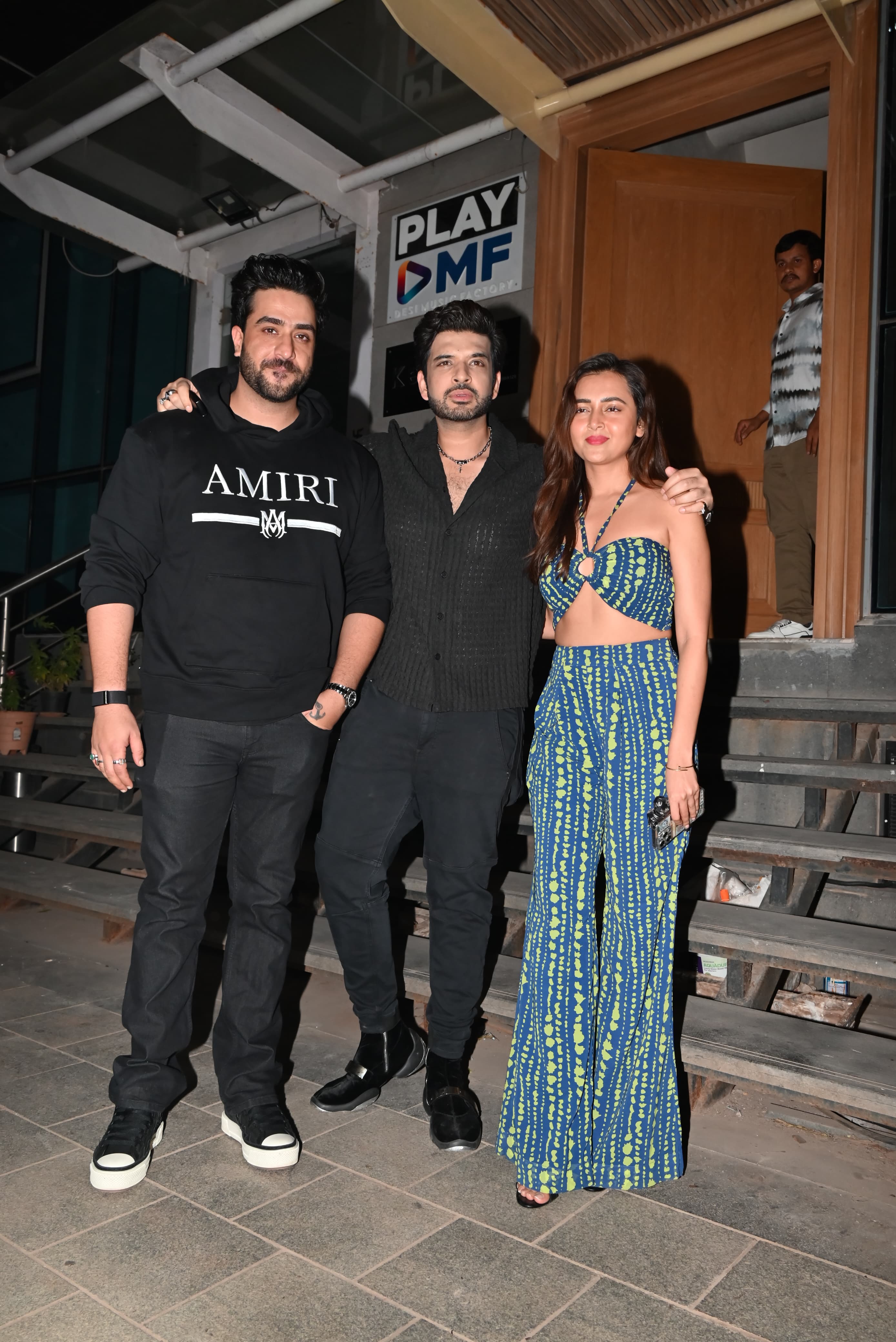 Tejasswi stunned in a blue outfit, while Karan looked smart in a black ensemble. Aly Goni also posed with them as they attended a party in the city.