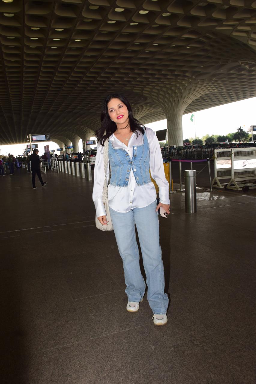 Sunny Leone looked youthful and adorable in a simple yet pretty outfit, posing cutely for the paps.