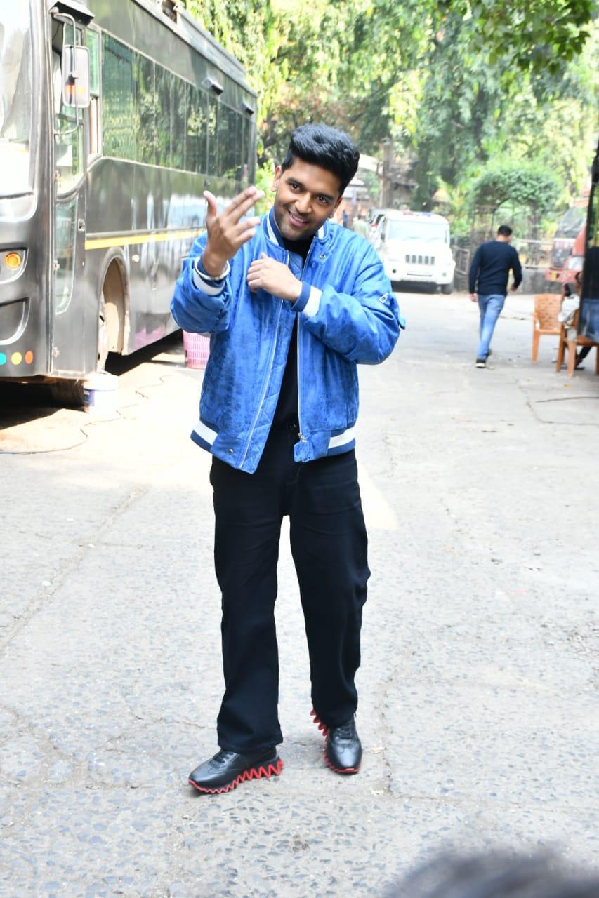 Guru Randhawa was all smiles as he was snapped in the city. The singer posed for the paparazzi