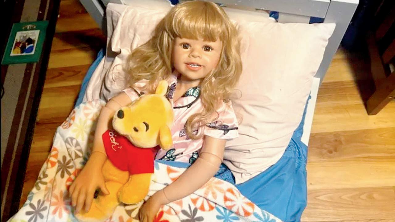 The dolls even have their own beds. Kelly takes out her dolls to play in the park. Kelly along with all her dolls. Pics/NY POST