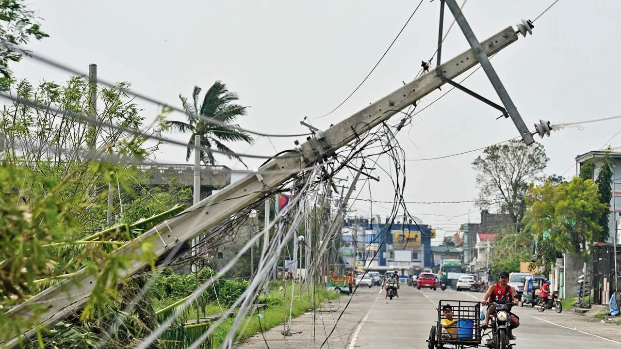 Typhoon floods villages, rips off roofs in north Philippines