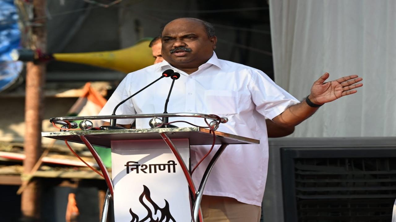 Legislative Council Member Anil Parab addresses the public rally  