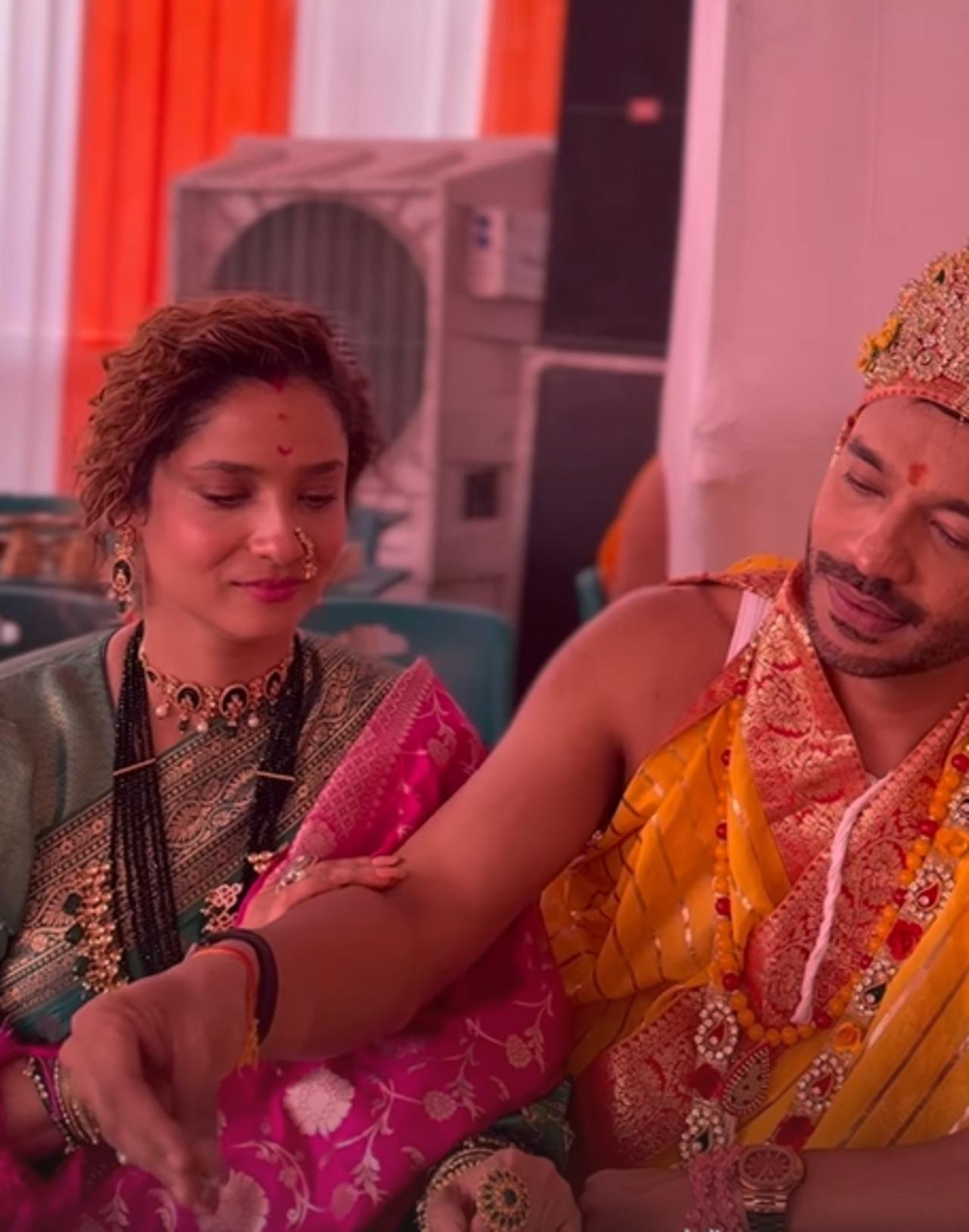 In the final image, Ankita and Vicky are seen participating in a meaningful ritual together, sharing a quiet moment of reverence and devotion as they perform the traditional ceremony before beginning their meal