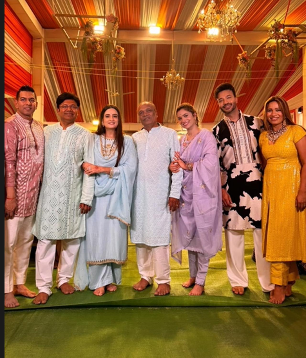 The couple is also seen posing for a happy family shot with Ankita’s sister-in-law, brother-in-law, and father-in-law.