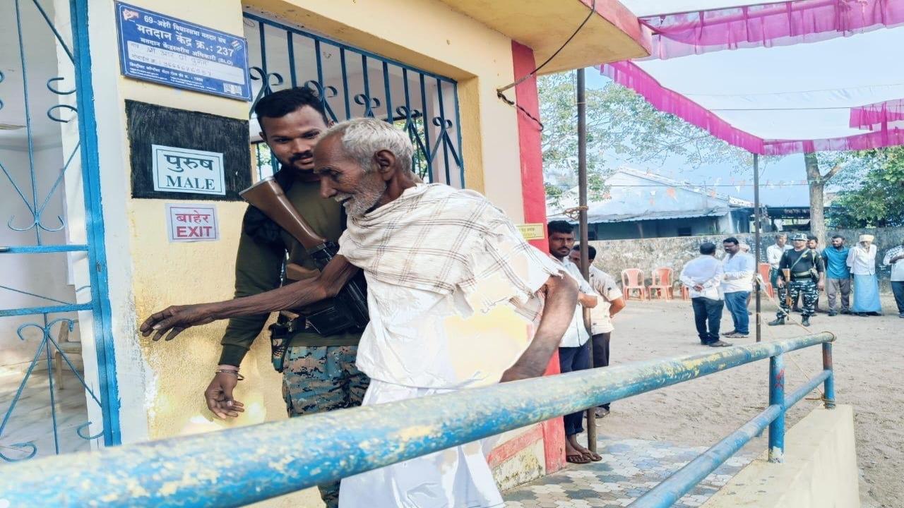 Another elderly man is assisted by a polling duty personnel in Gadchiroli. Tight security has been deployed at voting centres across Gadchiroli to prevent any untoward incidents